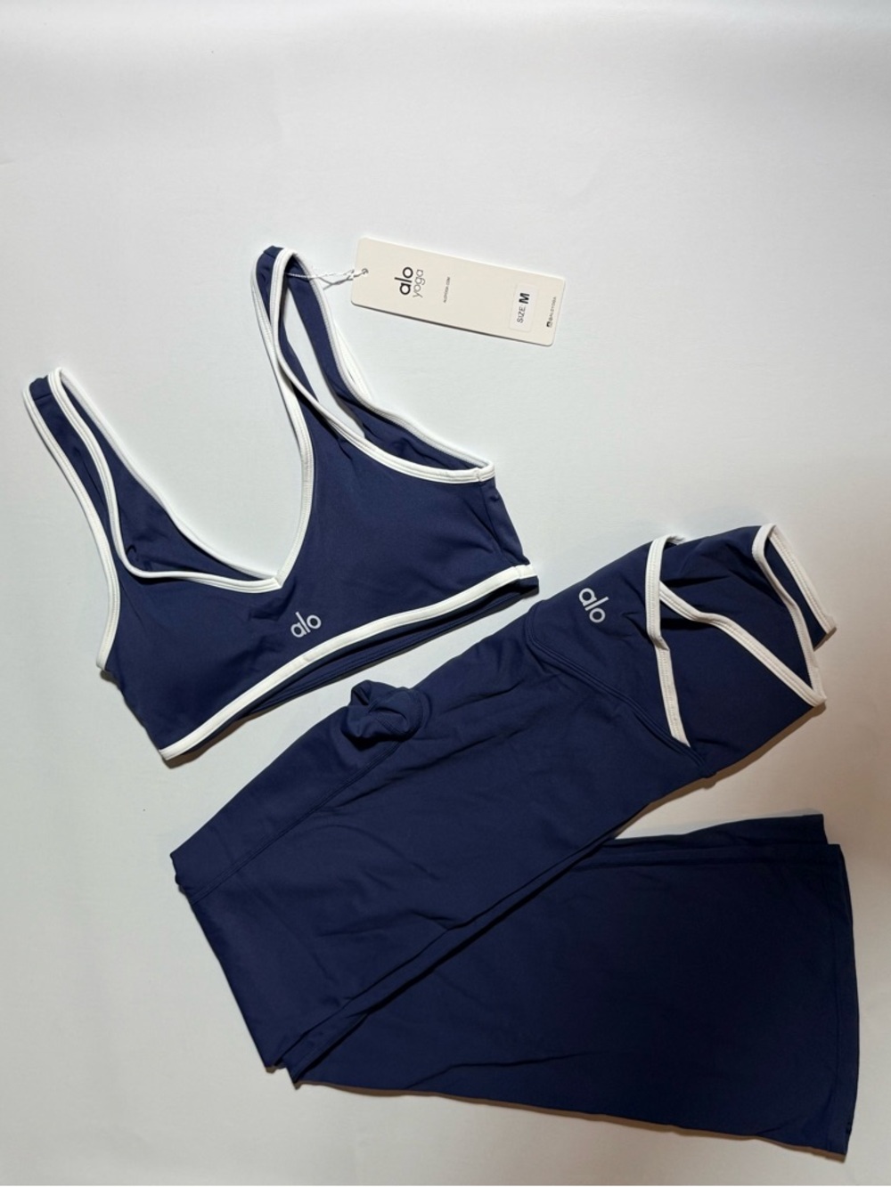 ALO Yoga Navy Blue Sports Bra and Leggings Set with White Trim